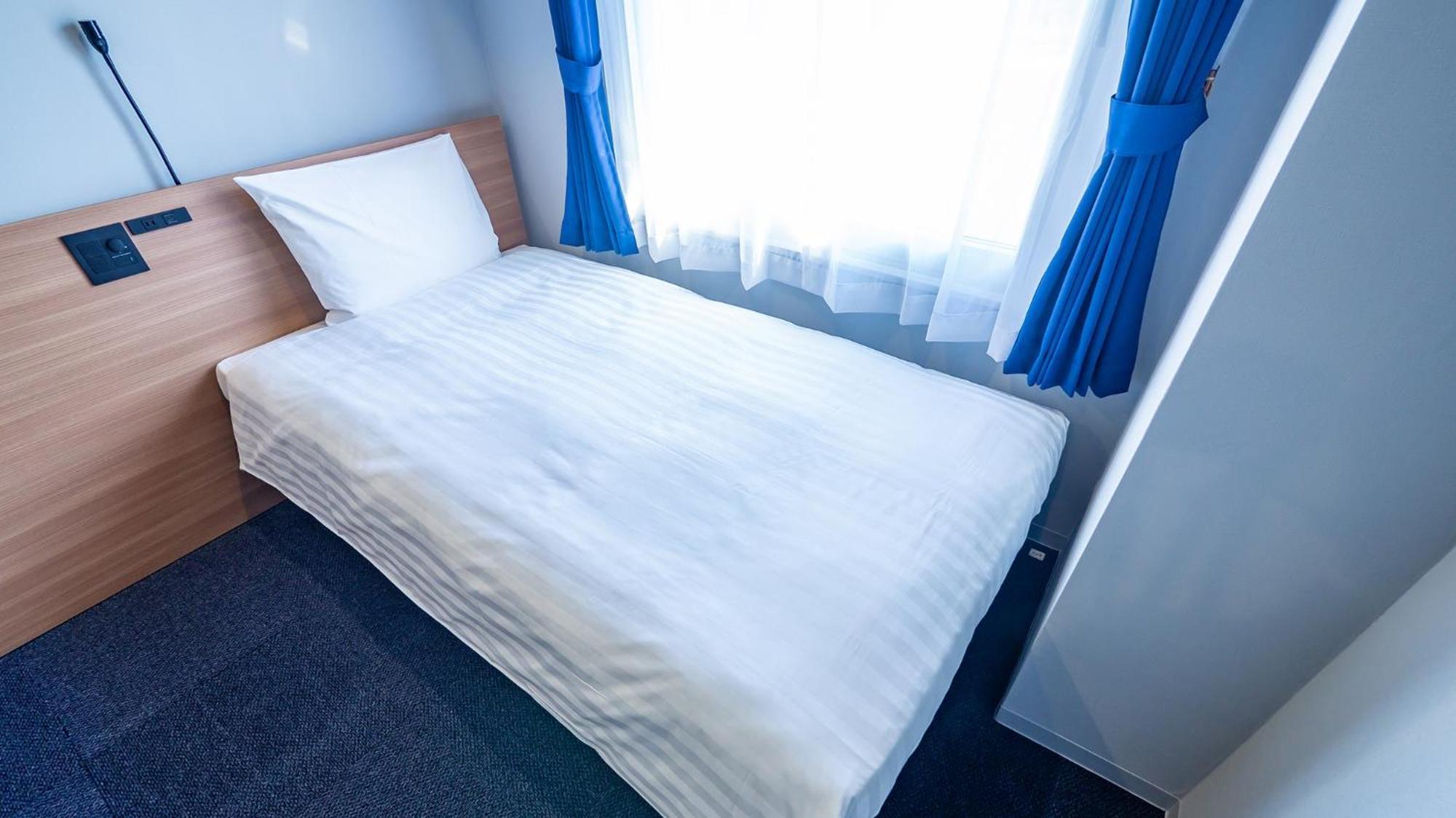 Toyoko Inn Nagasaki Ekimae Rum bild